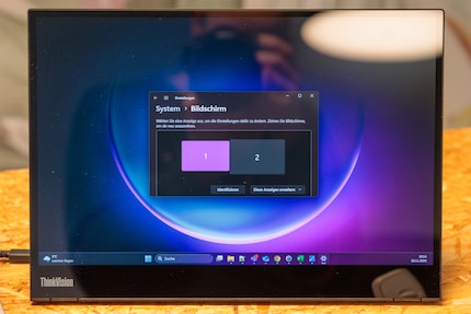Just specify where the external monitor is in the display settings.