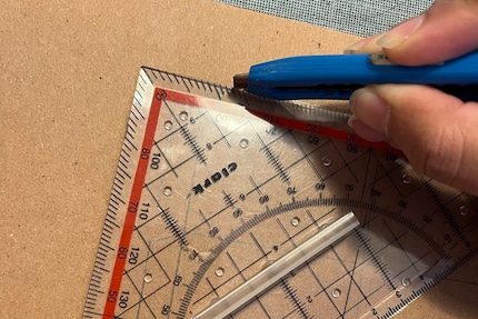 Use a protractor triangle to make the cuts straight and precise. 