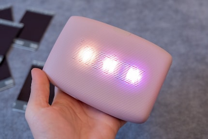 The Instax Mini Link3 greets me with three colourful LEDs when I switch it on.