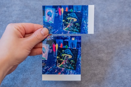 The result is comparable to Polaroid. Kodak just prints a bit darker.
