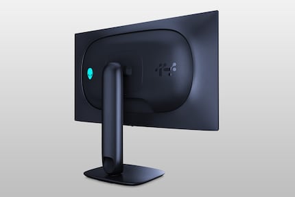 At the back, you can loop cables through the stand column.