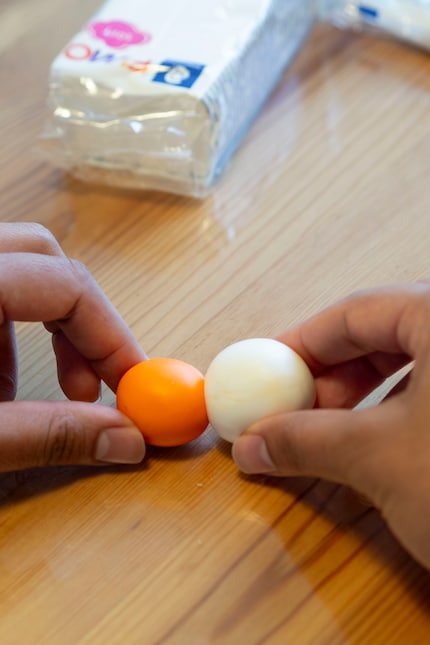 Roll the two balls