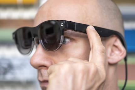 You should be able to control the AR glasses using the touch strip, but it doesn’t always work.