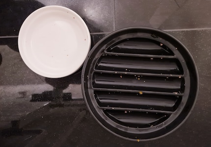 For comparison, here’s the massive ceramic feeder next to a regular bowl.
