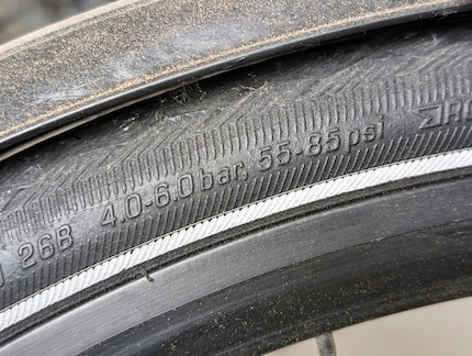 You should follow the pressure specifications on the tyre.