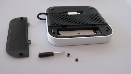 The compartment for the SSD is on the bottom of the Hub. Screws and a mini screwdriver are included in the box.