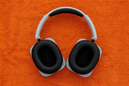 The ear cushions are made of plastic.