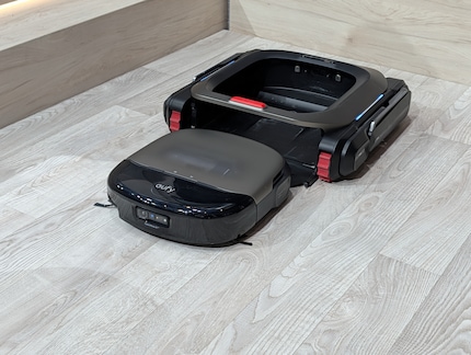 The Eufy Robot Vacuum Cleaner enters the Marswalker for transport.